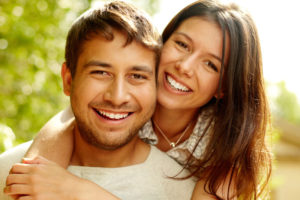 Dental Patients Smiling With Well Cared For Dental Implants In Blue Ridge, GA