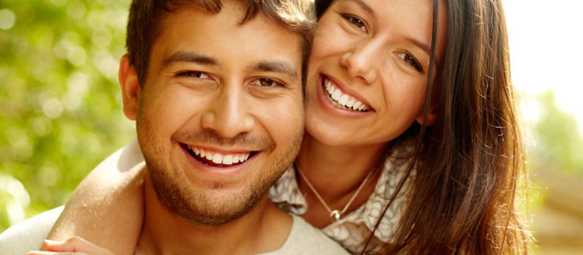 Dental Patients Smiling With Well Cared For Dental Implants In Blue Ridge, GA