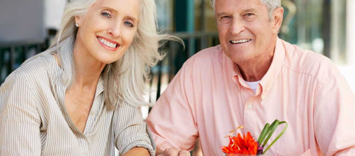 Dental Implant Patients Eating Together With Their False Teeth in Blue Ridge, GA